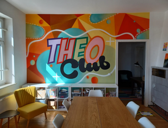 Buntes Graffiti des Theo-Club Logos